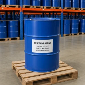 Triethylamine industrial grade in a blue 200L steel drum in an organized chemical warehouse, CAS 121-44-8, purity 99.9% min.